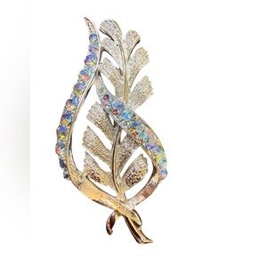 Vintage Coro stylized leaf brooch with aurora borealis rhinestones.
